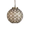 Polyhedron Pendant softly illuminated in elegant room with green molding and modern floral decoration