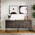 Mixed media artwork displayed on a low wood bench with beige vases and wall art in a minimalist room