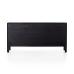Back view with plain black wood panel and exposed leg bases