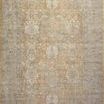Rectangular traditional rug in gold and sand tones with vintage-inspired intricate medallion pattern