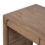 Close-up of Henry Desk surface and side panel junction with visible wood grain details