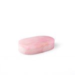Pink alabaster oval box viewed at an angle showing side profile and subtle veining