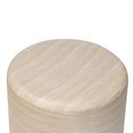 Overhead view showing circular top surface and subtle natural striations in finish