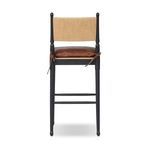 Rear view of Fayth stool showing tied cushion secured with leather straps