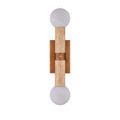 Overhead view emphasizing white veined globes on top and bottom of beige travertine center