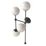 Angled view of Armstrong 4 L Sconce highlighting marbled glass texture and brass rods
