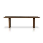 Wide rectangular bench matching the table’s thick slab style and brown finish