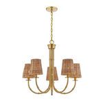 Chandelier angled to show front and slight side with warm brass finish and natural rattan shades lit