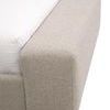 Close-up detail of footboard corner and wooden block foot with visible fabric texture