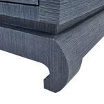 Ming Large 4-Drawer Dresser in warm navy blue with textured finish, podium base, and round metal ring drawer pulls.