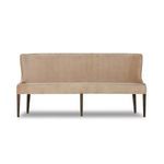 Diagonal front angle showing velvety texture and sturdy dark parawood bench legs