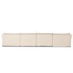 Back view showing slipcover fit and sectional's modular assembly