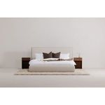 Pair of Osamu nightstands flanking a bed with neutral bedding in a minimalist bedroom setting