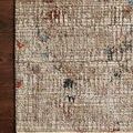 Leigh Ivory / Multi Rug with distressed modern floral motifs in beige, red, blue, and black on a textured background