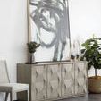 Wide view of dining room setup with multiple Linea side chairs in beige upholstery around concrete table