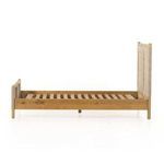 Footboard panel with woven rattan detail and tapered wooden legs in light natural finish