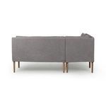 Back view shows clean lines and smooth linen fabric over entire L-shaped banquette