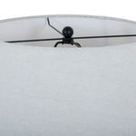 Top view of ivory linen lamp shade showing black metal spider fitter