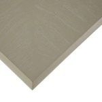 Close-up of tabletop corner showing white-cerused wood grain and square edge detail