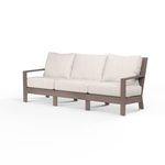 Laguna Sofa with aluminum frame finished to mimic driftwood and plush off-white cushions