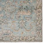 Another close-up of corner with visible ornamental wildlife and delicate fleur-de-lis pattern in teal and gold tones