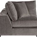 Side view showing wide armrest and bolstered pillow on the Lucca modular sectional corner