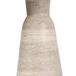 Side view of tapered pedestal base highlighting sandy grey textured cast concrete