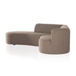 Sectional side view highlighting the rounded armrest and backrest profile