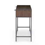 Upper angle focusing on walnut table surface with smooth polished finish