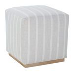 Side angle showing overall proportions and subtle curves of fabric on Dena Ottoman
