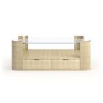 Square cocktail table with clear glass top, hand-applied Oracle leaf fluted corners, and open storage drawers