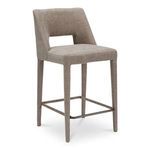 Three-quarter view showing the angled backrest and metal footrest bar on Joyce counter stool