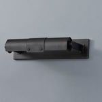 Oneonta light mounted on gray wall showing full length from a distance