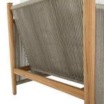 Angled close-up of rear side highlighting taut gray woven rope and teak support bar