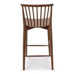 View from the back with vertical spindles and crossbars connecting tapered walnut legs