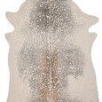 Bryce metallic cowhide rug with neutral beige and gray tones and gold accents, irregular natural cowhide shape