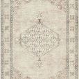 Lila brown and orange vintage style machine woven rug with central medallion and decorative border in muted tones