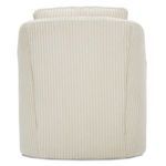 Rear-side perspective focusing on barrel back and softly curved armrest in cream ribbed fabric