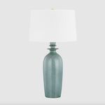 Bellmawr Table Lamp against light grey background on plain surface, full lamp with wide white drum shade