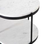 Detailed view of middle marble shelf and iron frame connection on Felix Oval Nightstand