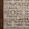 Corner close-up highlighting intricate patterned border on the vintage style midnight rug