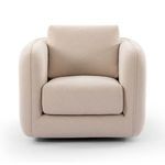 Front view with thick seat cushion and wide rounded armrests on cream swivel chair