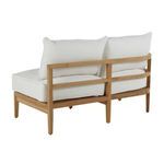 Rear three-quarter view highlighting stacked horizontal rails on teak frame with white cushions