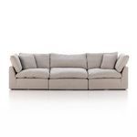 Front view highlighting symmetrical cushion arrangement and plush seating
