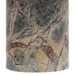Close-up of green marble base showing detailed natural veining patterns with shades of brown and black