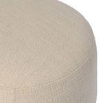 Top angled view showing curved edges and fabric stitching details on Bilbury Ottoman