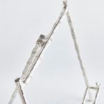 Close-up of top section of Baldwin Easel with bamboo texture on a plain white background