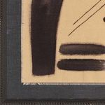 Close-up of the bottom left corner showing frayed edges of beige fabric and textured dark fabric background beneath