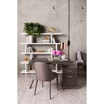 Miri Large Shelf placed in industrial-style room with concrete walls next to a modern desk and chairs, decorated with book...