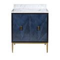 Side profile showing smooth black panel and brass leg elegance on vanity